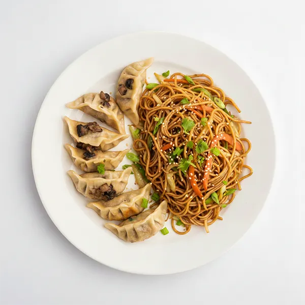 Savoury Mushroom And Cheese Dumplings With Stir-Fried Hakka Noodles